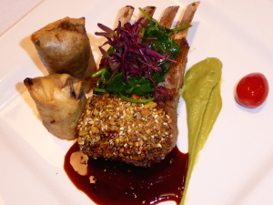 Photo of rack of lamb on a white plate